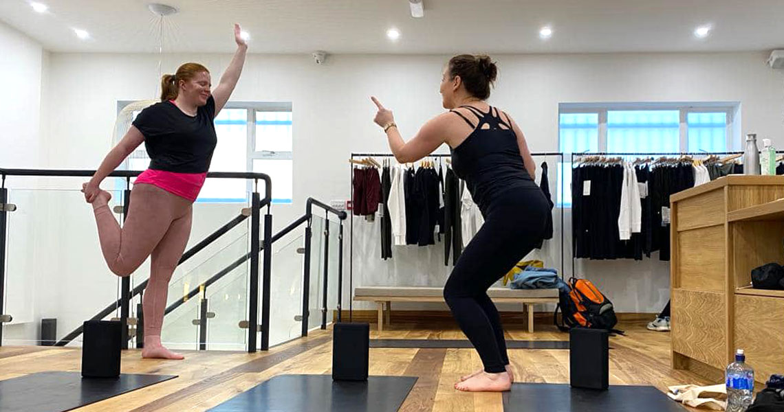 Instructor teaching yoga at Hot Yoga Athlone.